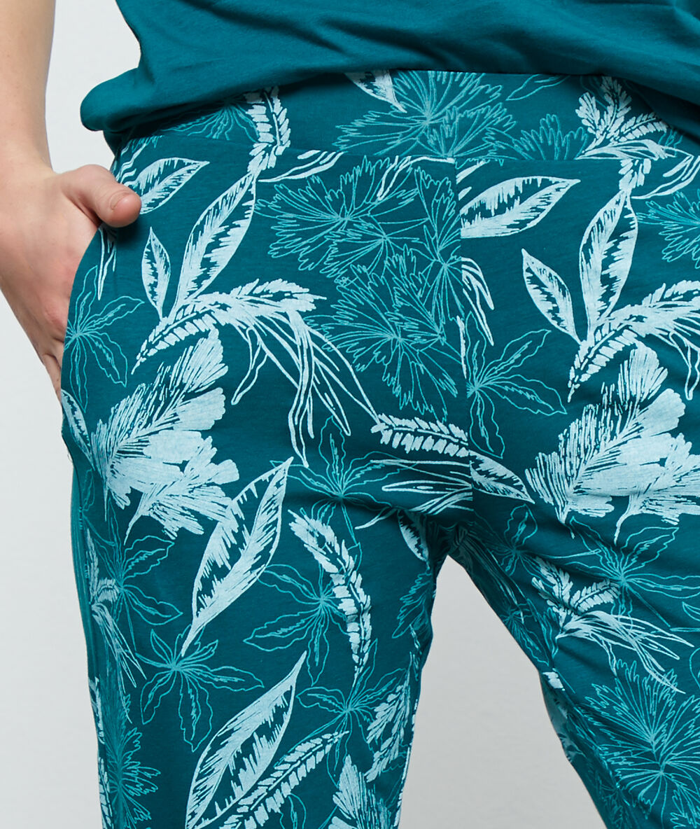 Pantalon imprimé vert.