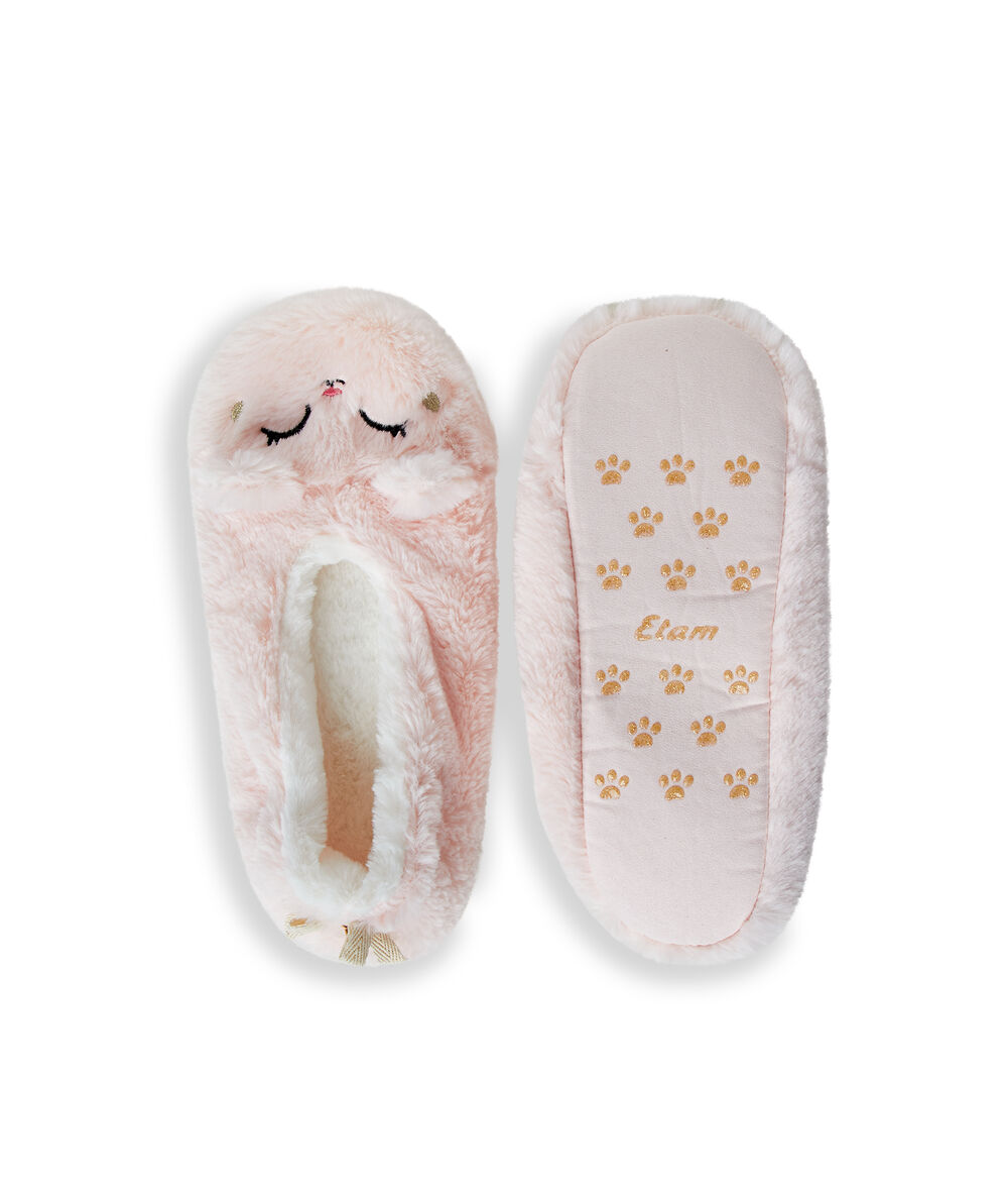 Chaussons fourrés à mini grelot rose.