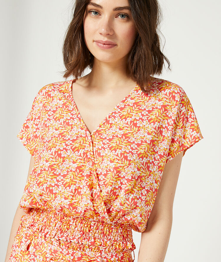Top smocké imprimé fleuri corail.