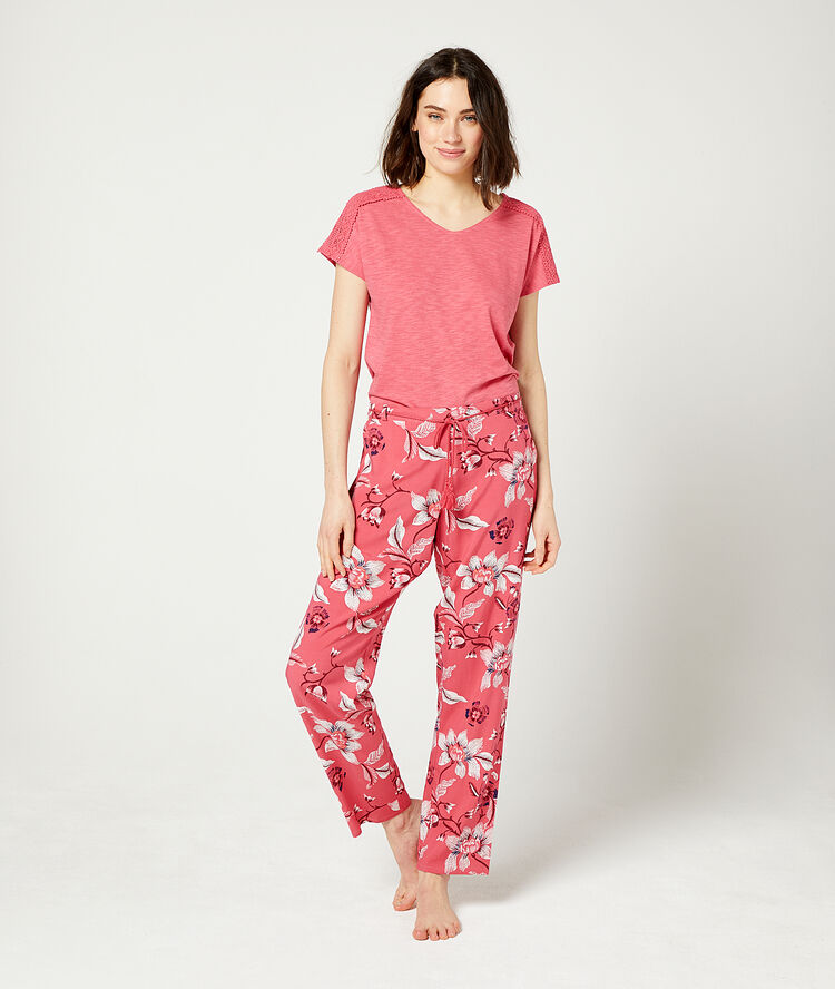Pantalon imprimé fleuri corail.