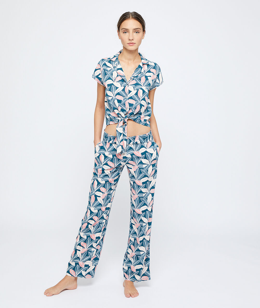 Pantalon imprimé feuillage multicolore.