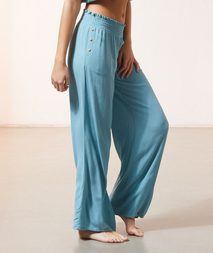 Pantalon large bleu vert.