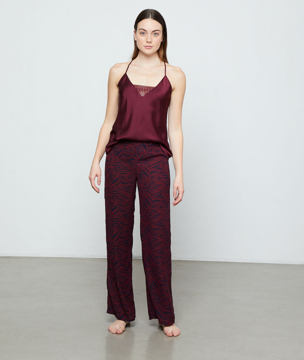 Pantalon imprimé bordeaux grenat.
