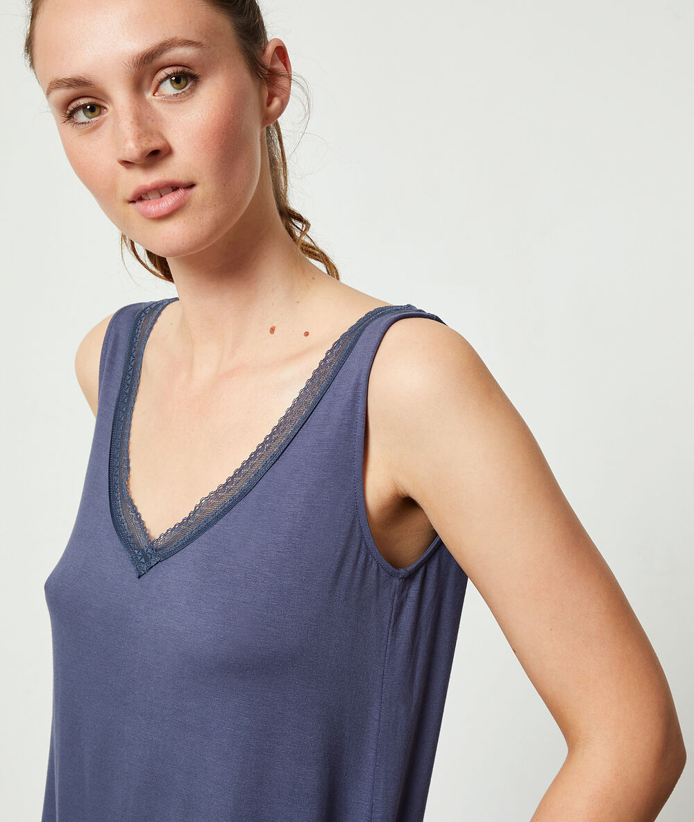 Débardeur avec dentelle bleu.