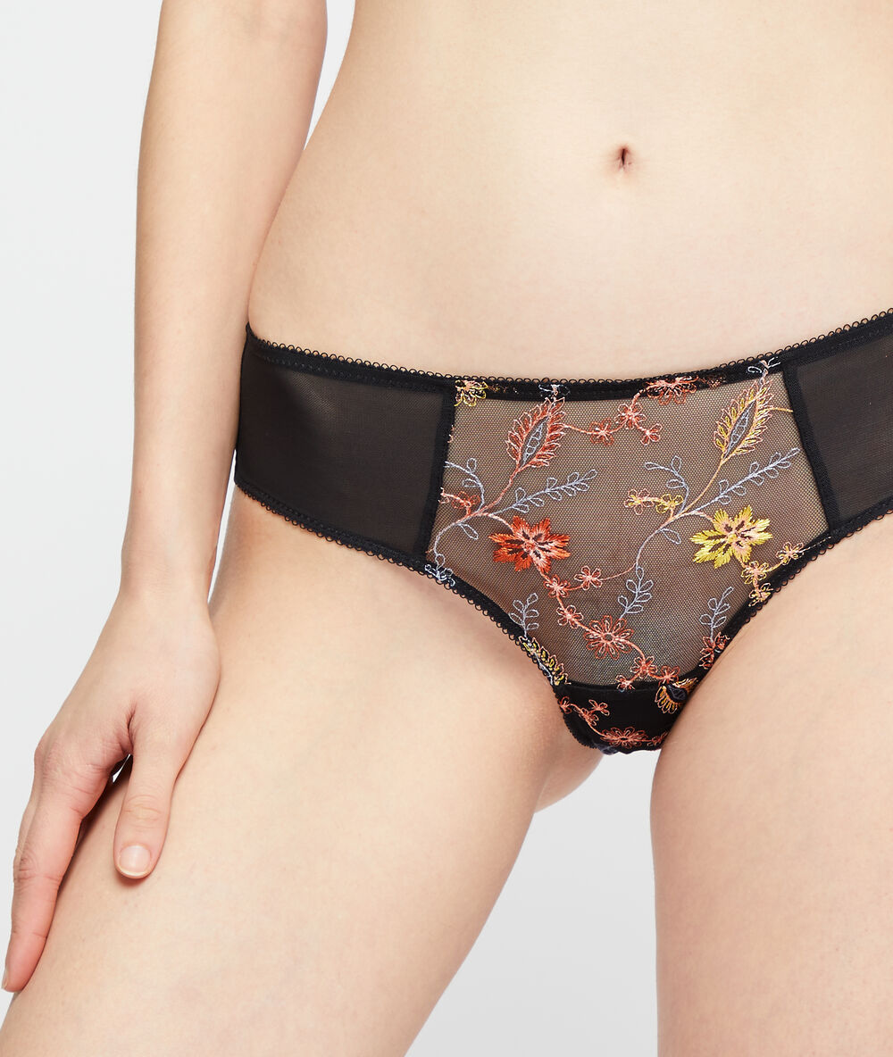 Shorty à broderies florales noir.