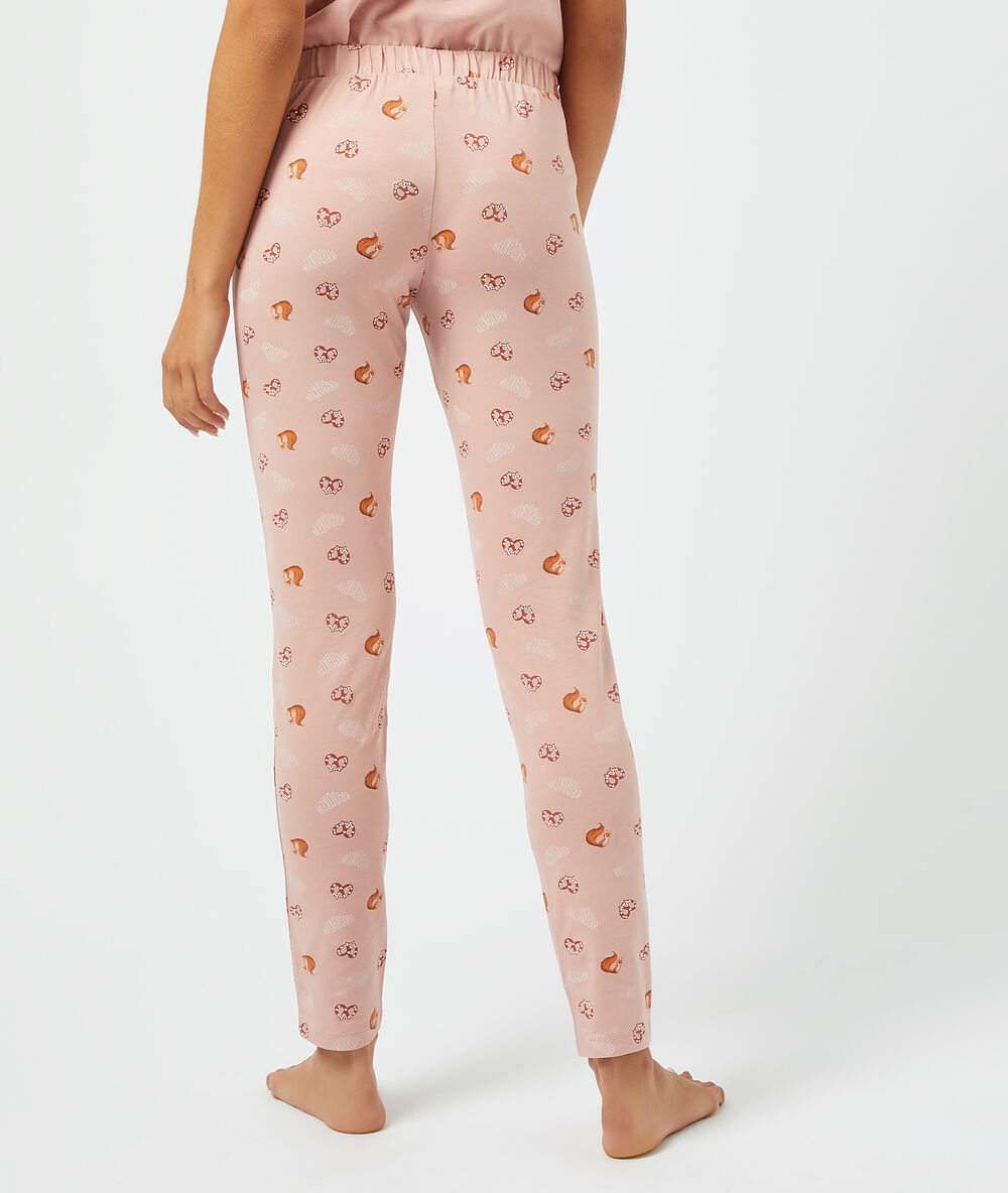 Pantalon imprimé rose.