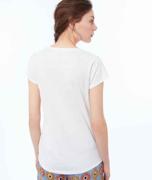T-shirt à message blanc.