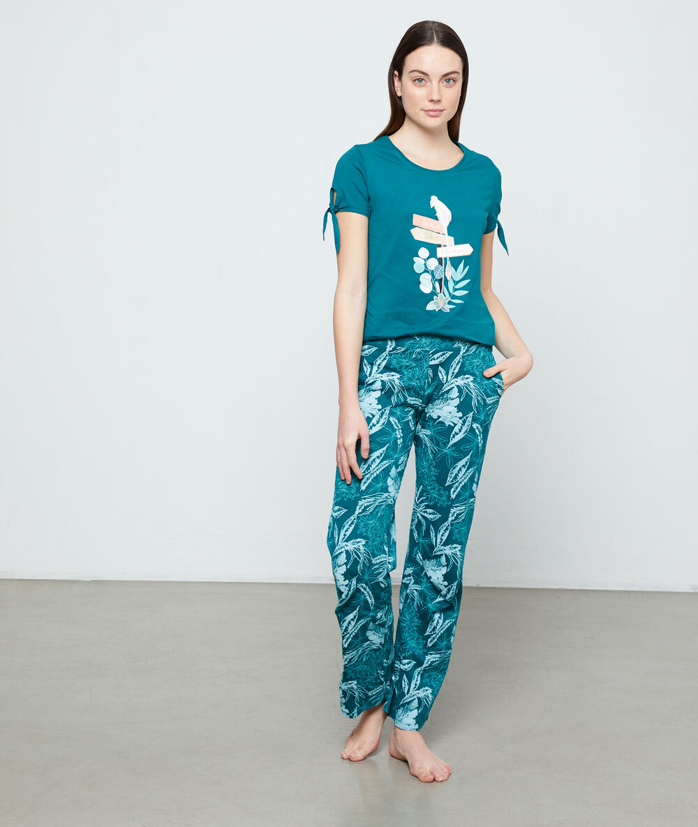 Pantalon imprimé vert.